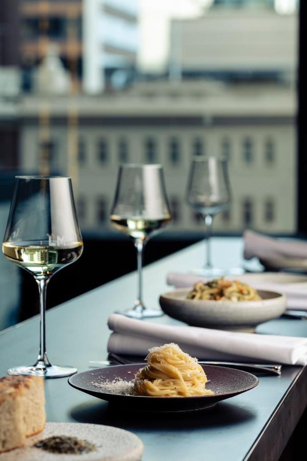 Next Hotel Melbourne, Curio Collection By Hilton Extérieur photo Wine glasses