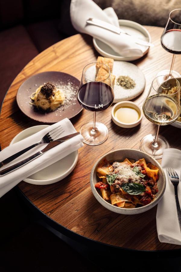 Next Hotel Melbourne, Curio Collection By Hilton Extérieur photo A selection of dishes at the restaurant